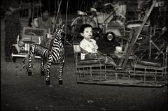 Zebra without and child with thanaka.