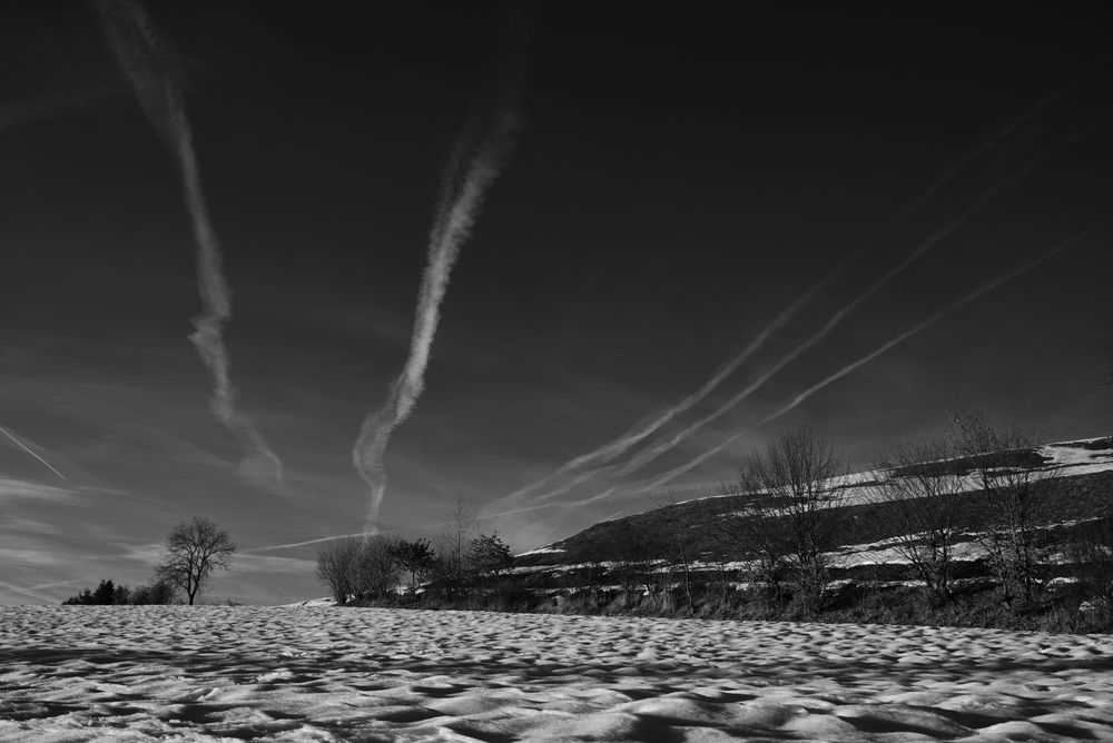 zerkratzter Himmel