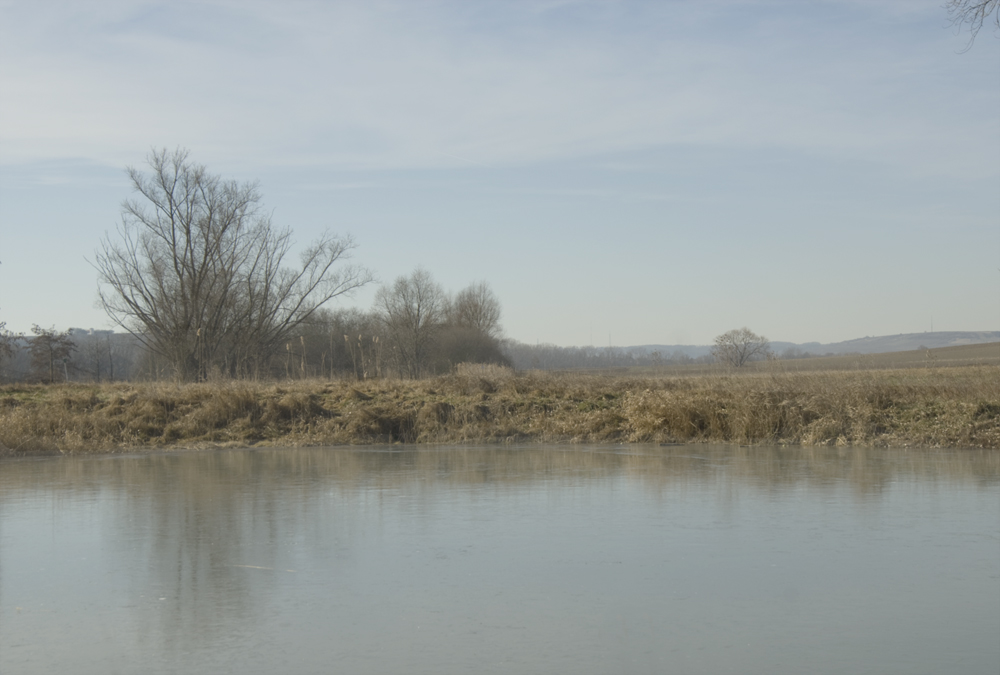 zugefrorener Weiher