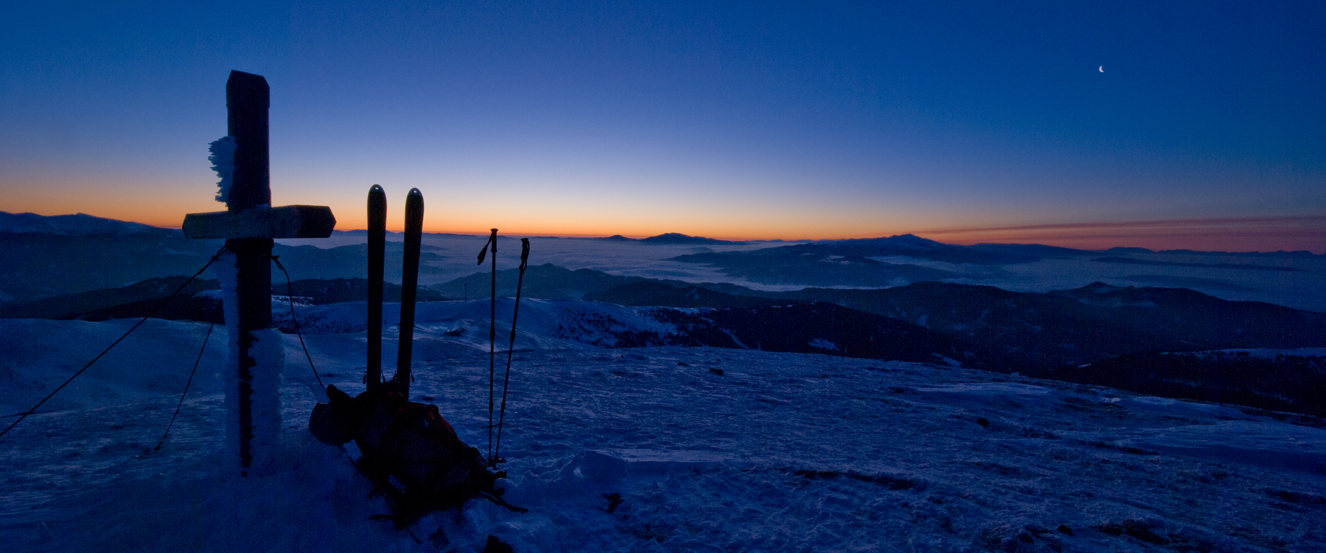 zum Sonnenaufgang am Gipfel