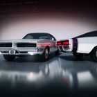 Zwei Dodge Charger 1969 mit Spiegelungen