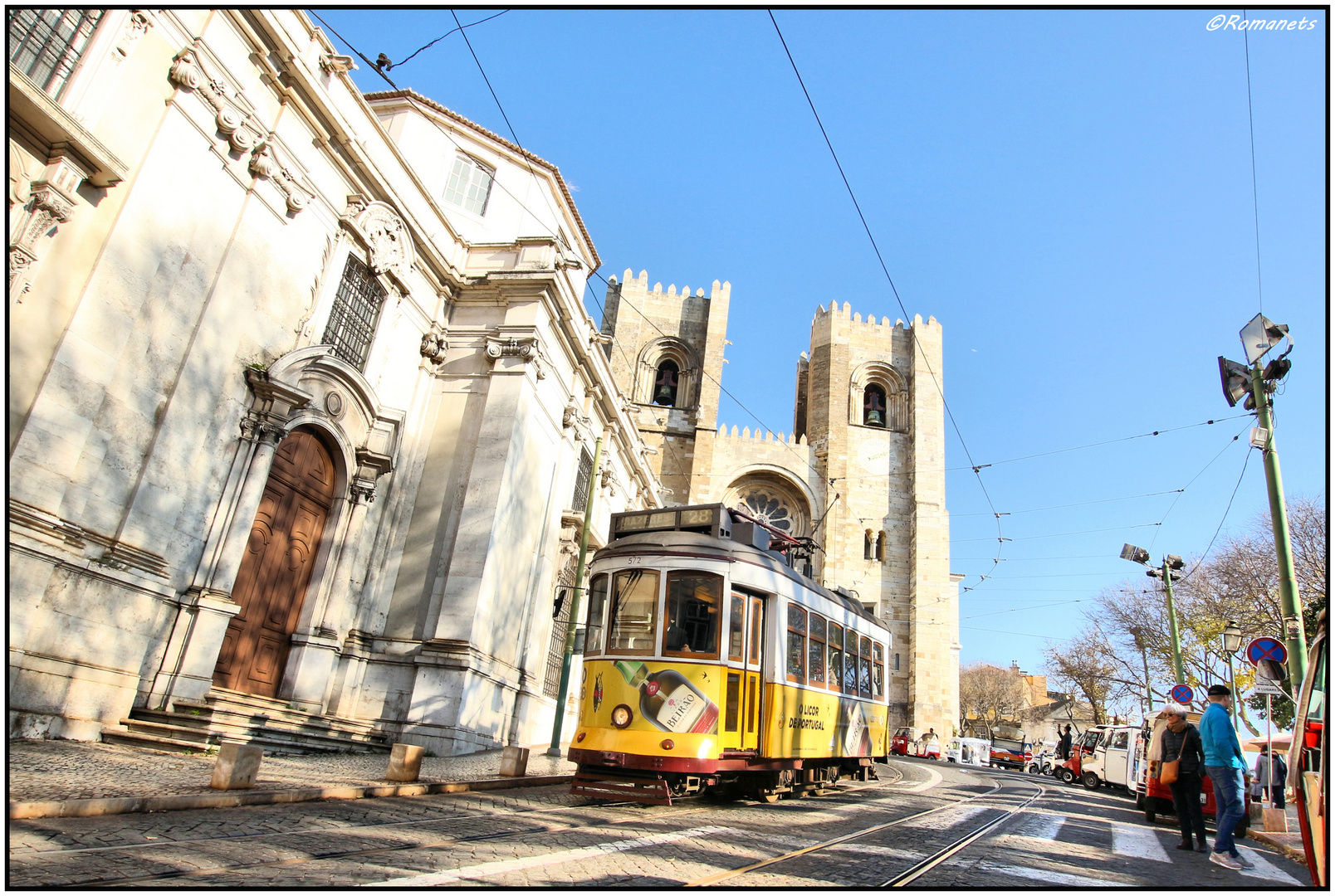 Zwei Wahrzeichen der Stadt Lissabon ist die Catedral Sé Patriarcal und die alte Lisbon Tram